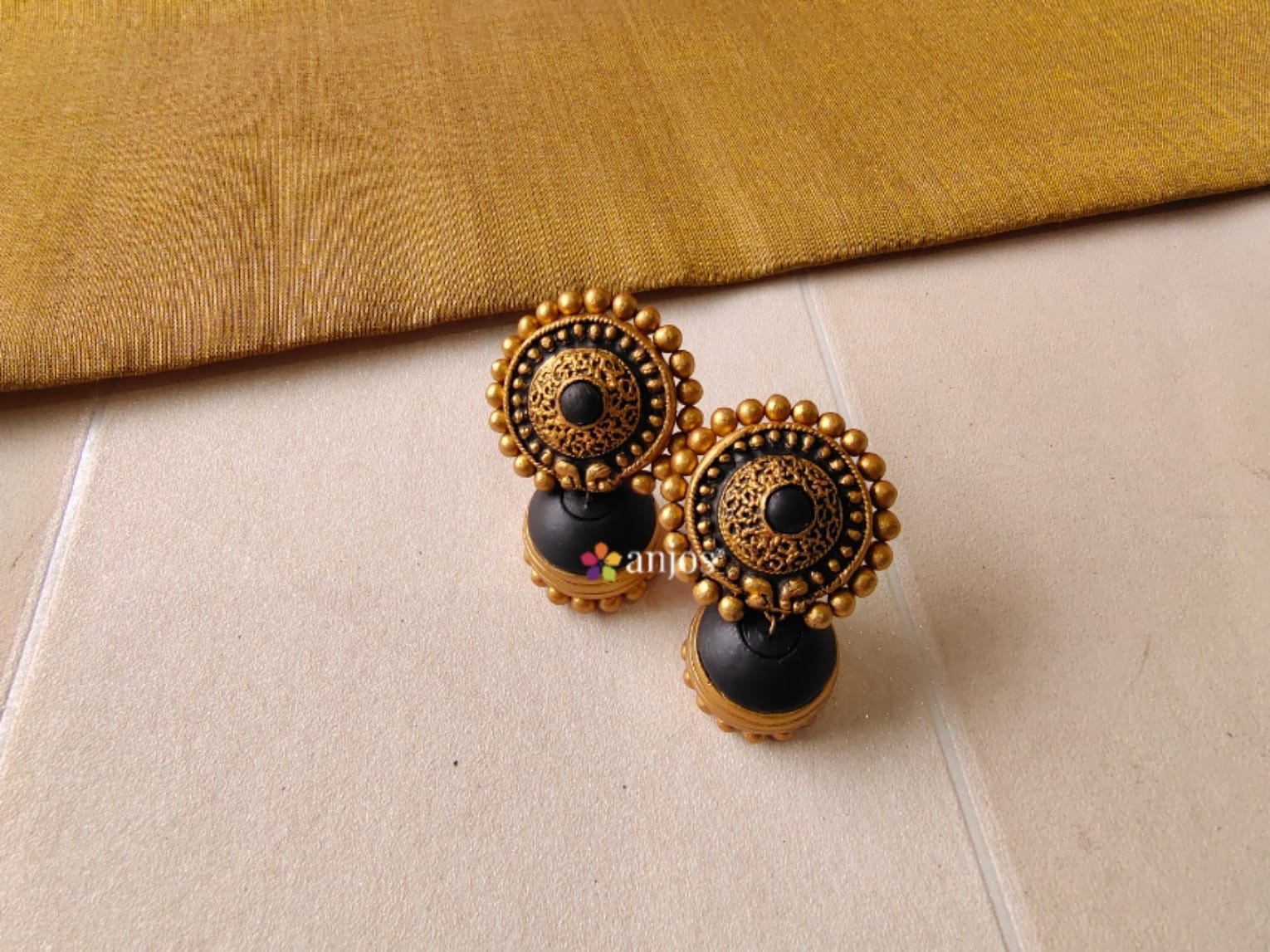 Buy Antico Traditional Festive Black Color Pearl Oxidized Big Jhumka  Earrings for Girls Online at Best Prices in India - JioMart.